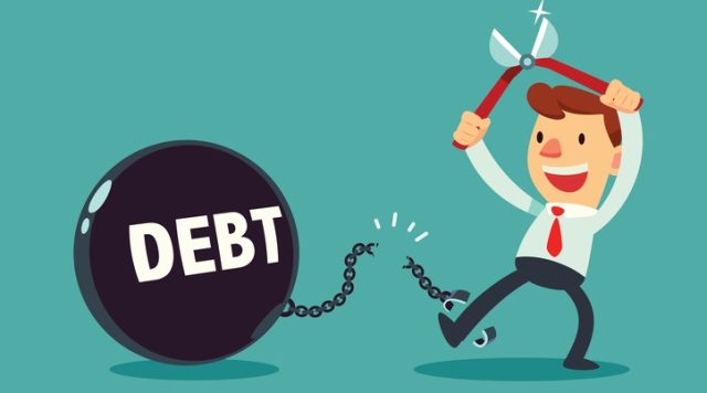 businessman use pliers to cut the chain and debt metal ball