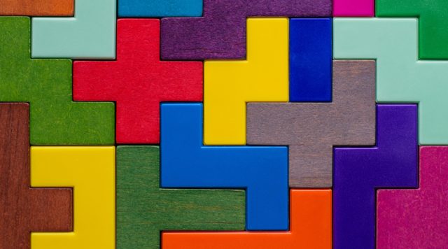 Background with different colorful shapes wooden blocks