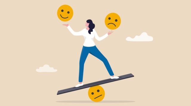 Cartoon of a woman standing on a beam trying to balance while holding a smiley face in one hand and a sad face in the other