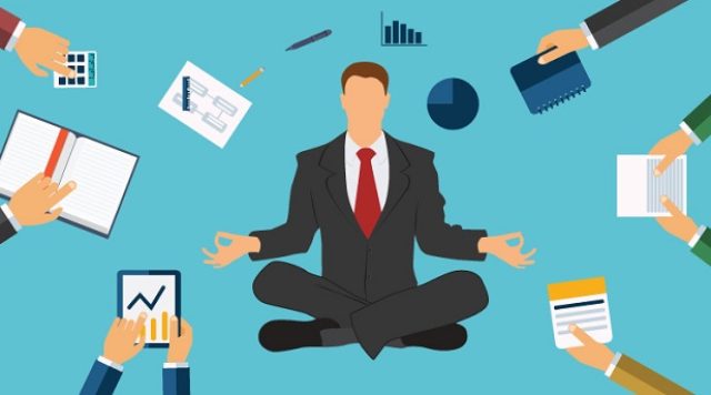 Cartoon of a man sitting cross-legged with arms in a peaceful pose while distractions surround him