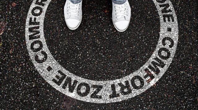 A person standing within a circle labeled "comfort zone"