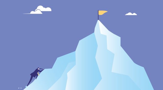 Cartoon of a man climbing a steep mountain with a flag at the top