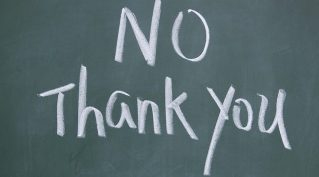 "No thank you" written on a chalkboard