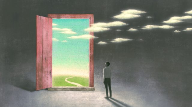 Drawing of a man standing in a gray space looking at an open door with a sunny sky and bright colors outside