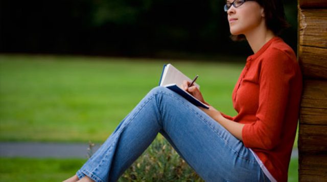 woman-writing-in-a-journal